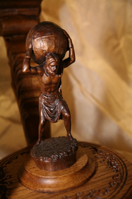 Atlas Carving in Base